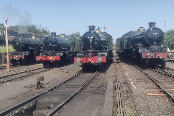 a steam train on a steel track