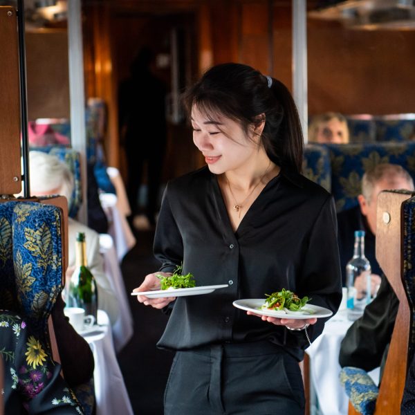 a woman sitting at a table