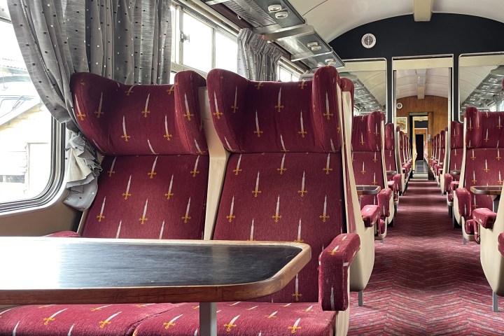 a chair sitting in front of a table