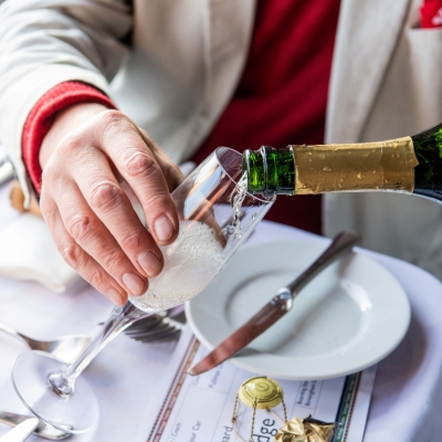 a table topped with a blue chair