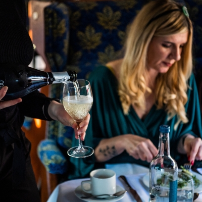 a table topped with a blue chair