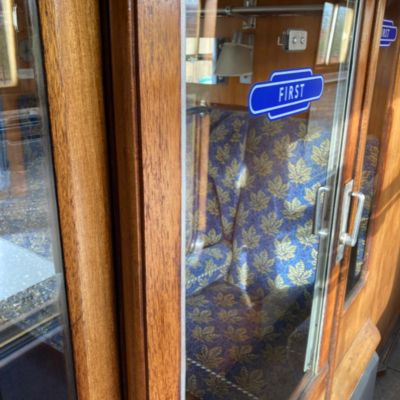 a bedroom with a large tub next to a sink