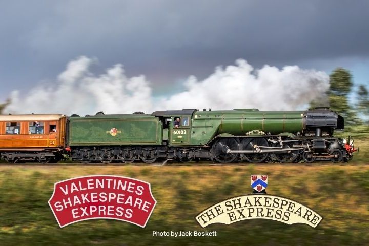 Green steam train pulling vintage carriages under cloudy sky with 'Shakespeare Express' logos.